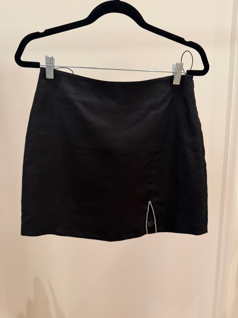Black Mini Skirt with Subtle Front Cutout and Accent Trim
